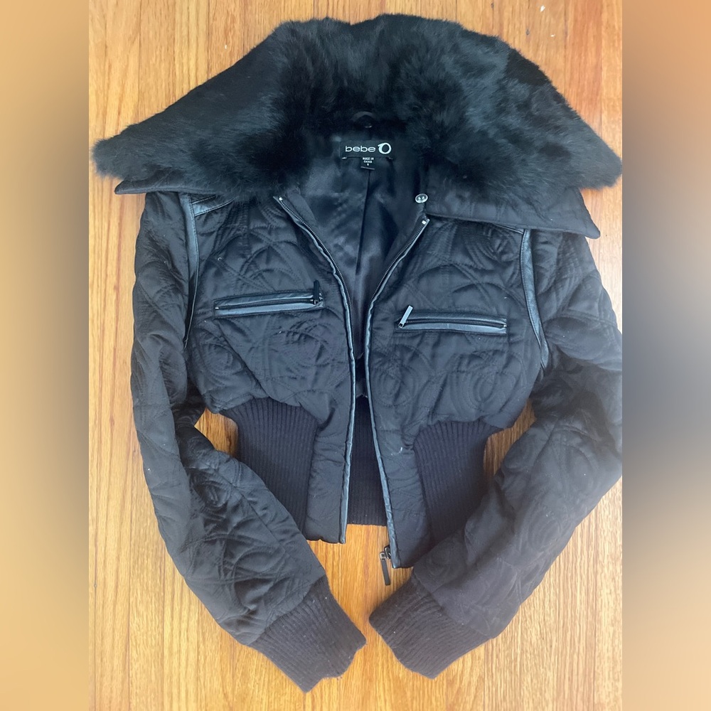 Black Bebe cropped jacket.